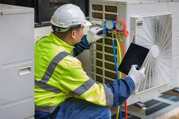 Professional Hvac technician working in Bayport, NY
